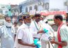 कांग्रेस के पदाधिकारियों द्वारा लोगो को जागरूक व वितरण किये गये मास्क